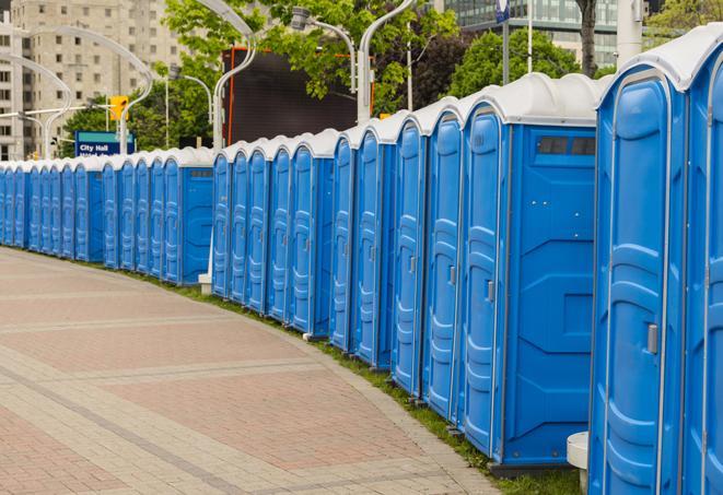 a line of brightly-colored portable restrooms, perfect for outdoor festivals and concerts in Baldwin Park CA